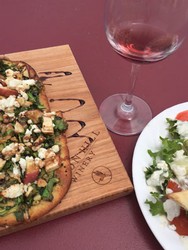 flatbread pizza paired with Heron Hill wine