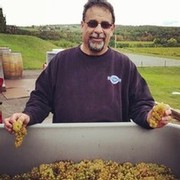 Barry Tortolon winemaker with chardonnay