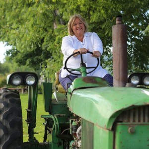 Nancy Fuller Celebrity Chef on tractor