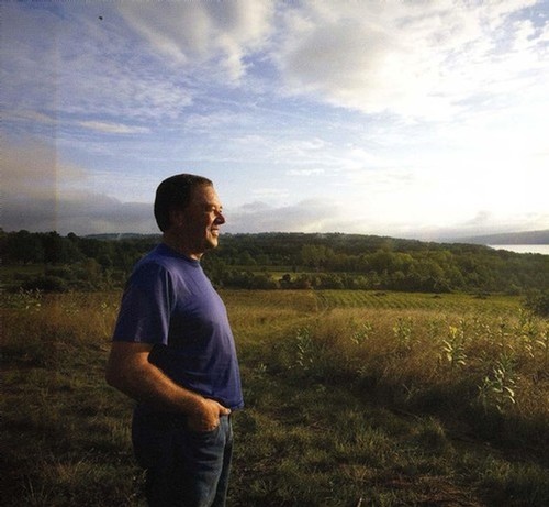 Owner John Inlge looking over vineyards smiling