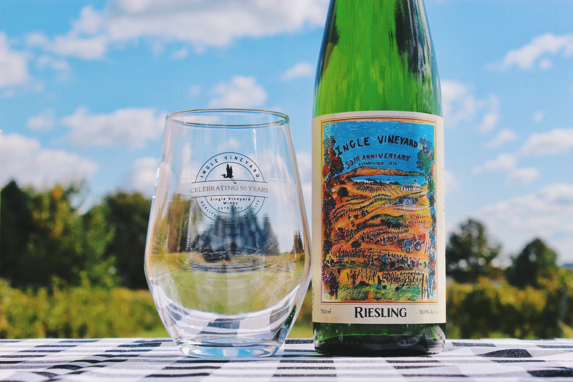 A bottle of our 50th celebration riesling and a glass. 