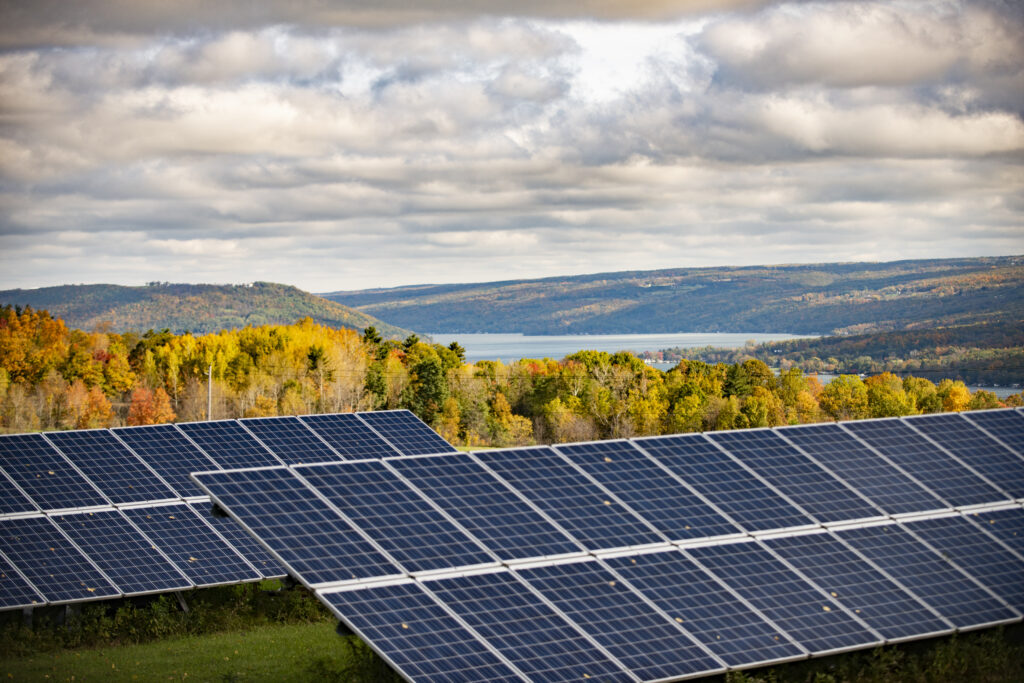 Heron Hill Winery's Solar Panels with view of Keuka lake behind